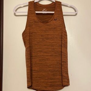 Nike Dri-Fit Tank. Size X-Small. Rusty Orange with Black Lines.